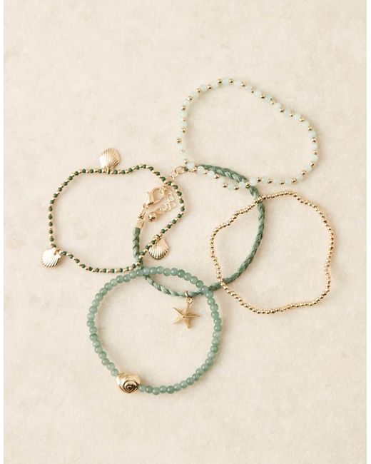 Bracciale Multifilo Dorato Con Design Con Conchiglie di ASOS in Natural