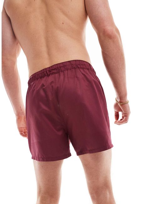 Pantaloncini da bagno taglio corto bordeaux con pannelli laterali a contrasto di ASOS in Red da Uomo