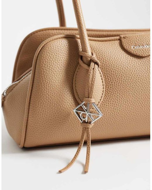 Calvin Klein Natural Emblem Grain Texture Shoulder Bag With Hardware Charm