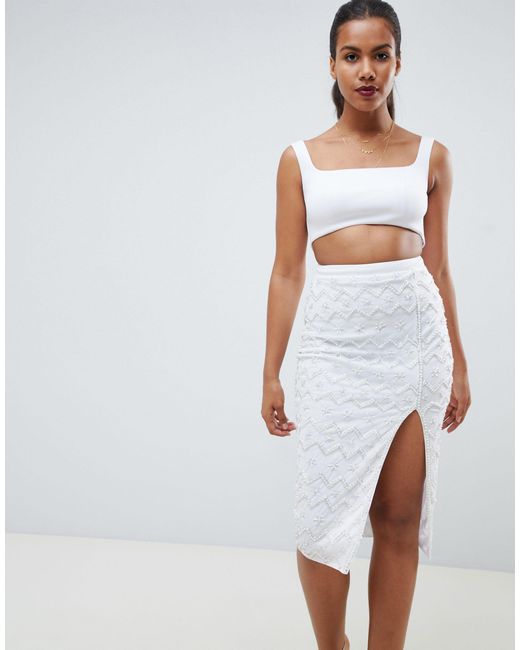 white sequin midi dress