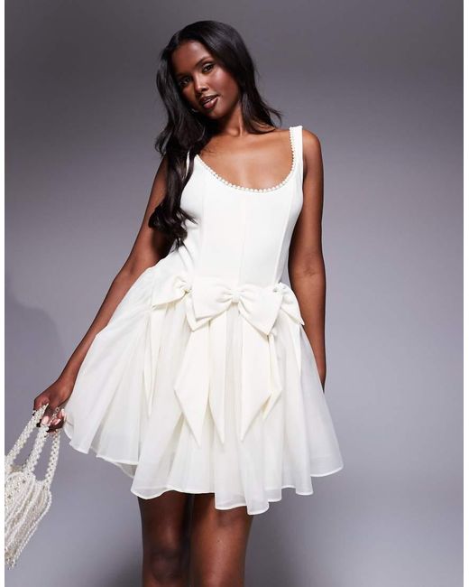 Vestido Corto Con Cuerpo Estilo Corsé, Ribete De Perlas Y Lazos De -Blanco ASOS de color Purple