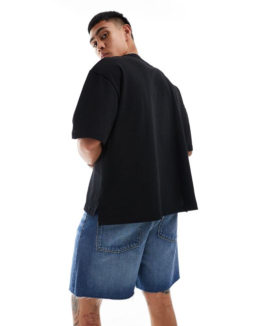 Bermuda classique en jean à ourlets bruts - moyen délavé ASOS pour homme en coloris Black