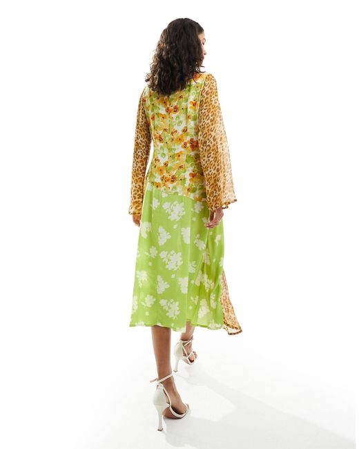 Robe mi-longue à manches longues avec imprimés fleuri et léopard contrastants Never Fully Dressed en coloris Yellow