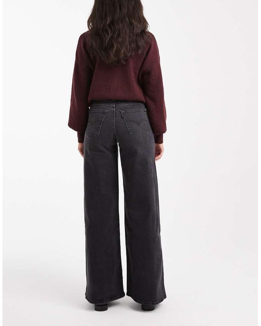 Vaqueros Negro Lavado De Talle Alto Y Pernera Ancha Elástica 728 De Levi's de color Black