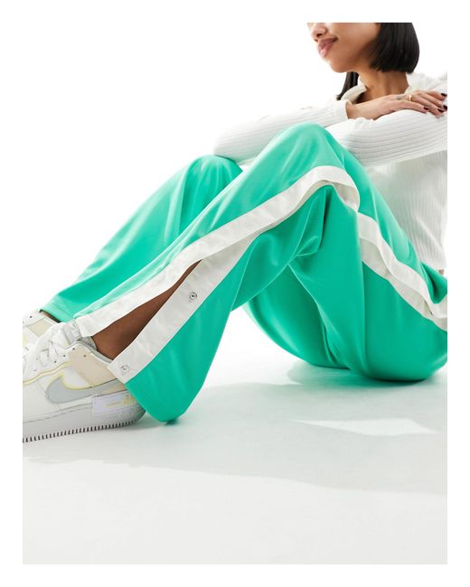 Air break away - pantaloni a vita medio alta primavera di Nike in Green