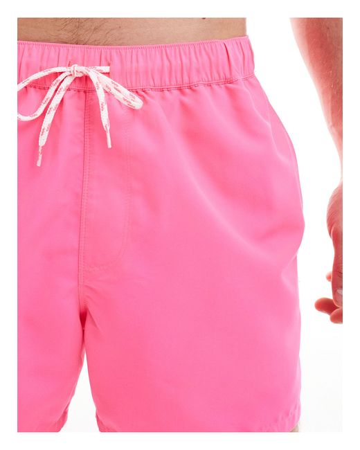 Pantaloncini da bagno fluo taglio corto di ASOS in Pink da Uomo