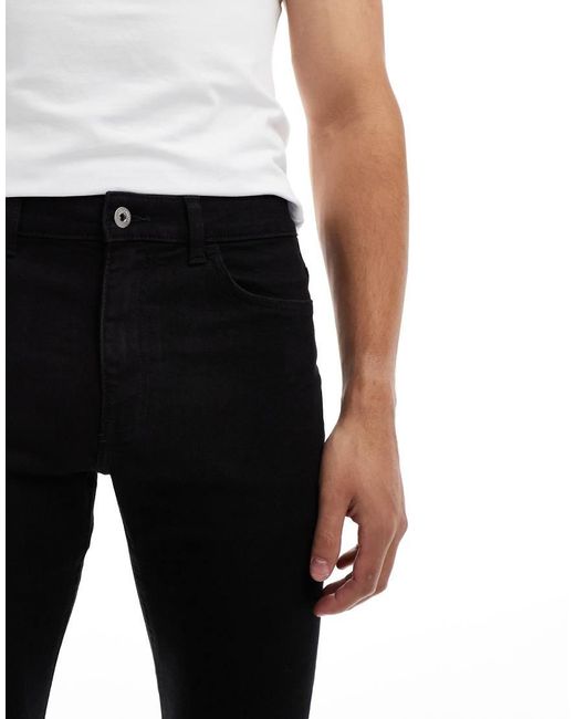 Vaqueros Negros De Corte Pitillo Y Talle Medio De Collusion de hombre de color Black