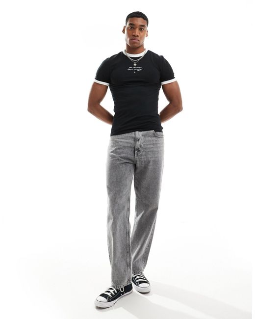 T-shirt moulant à bordures contrastantes avec inscription sur la poitrine ASOS pour homme en coloris Black