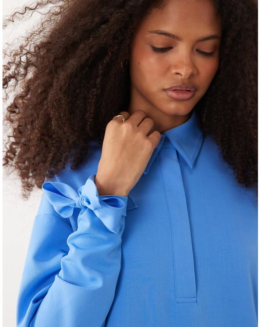 Chemise d'ensemble longue à détail boutonné Iyal en coloris Blue