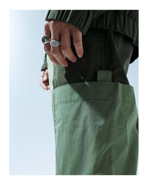 Pantalones cargo s holgados con paneles en contraste ASOS de hombre de color Green