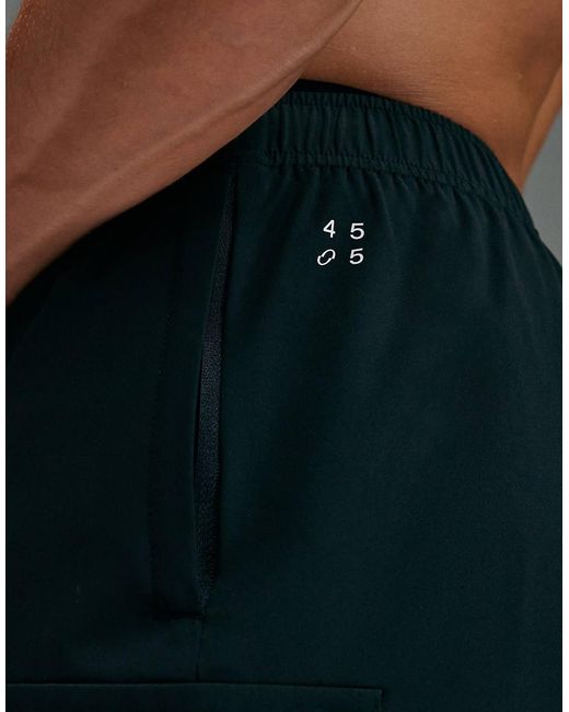 4505 Black Icon 7 Inch Quick Dry Training Cargo Shorts With Zip Pockets for men