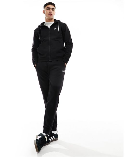 Armani - - tuta sportiva nera con joggers e felpa con cappuccio, zip e logo davanti e dietro di EA7 in Black da Uomo