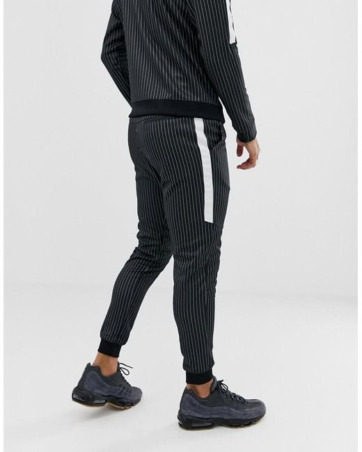 Nike Synthetic Pinstripe Joggers In Black Bq0676-010 for Men | Lyst  Australia