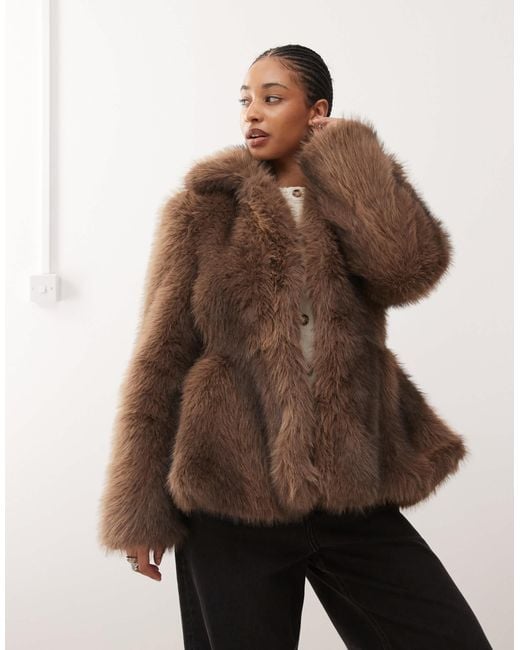 Monki Faux Fur Jacket With Peplum Hem in Brown | Lyst