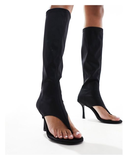 Devi - bottes hauteur genou à entre-doigts Public Desire en coloris Black