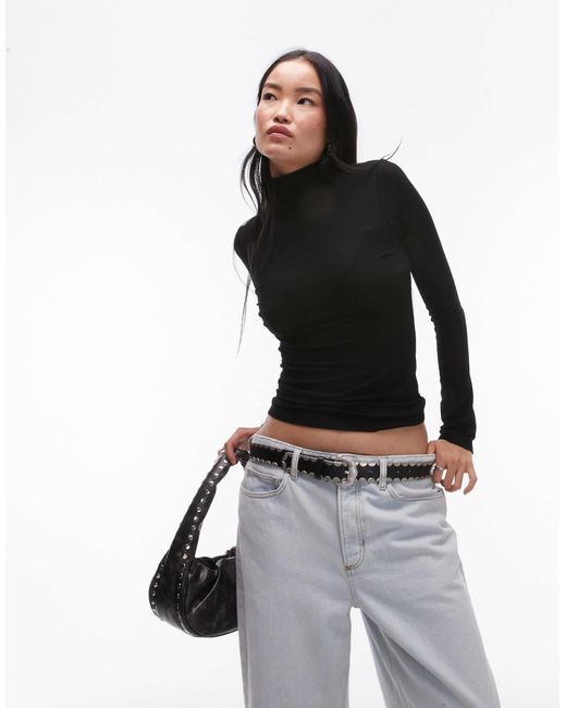 Top côtelé à manches longues et col cheminée TOPSHOP en coloris Black