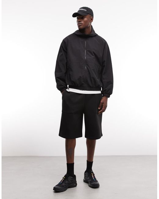 ASOS Blue Stormmaxtm Water Repellent Packaway Rain Jacket for men
