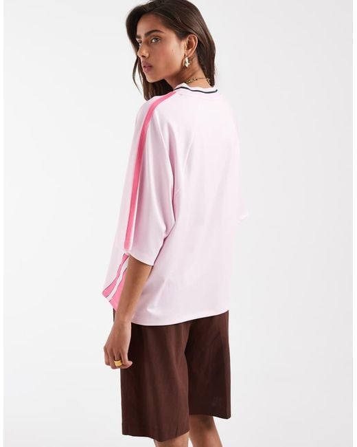 ASOS Pink Oversized V Neck Football T-Shirt With Graphic