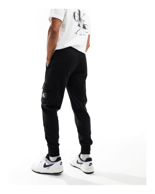 Pantalones negros con parche Calvin Klein de hombre de color White