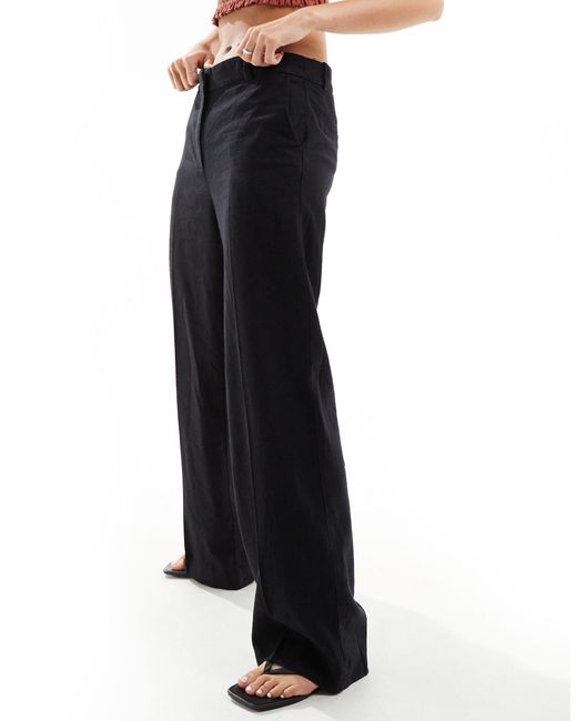 Emmie - pantalon taille basse en lin mélangé Weekday en coloris Black
