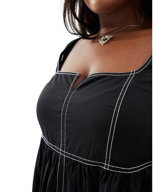 Plus - robe babydoll longue en coton avec col cranté Collusion en coloris Black