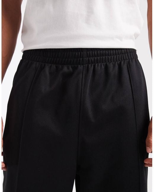 Adidas Originals Black Baggy Track Pants for men