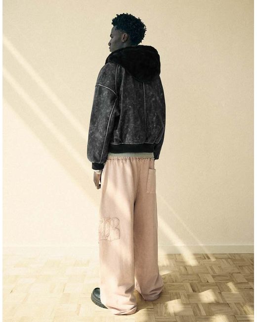 Bershka Black Reversible Faux Fur Hooded Jacket for men