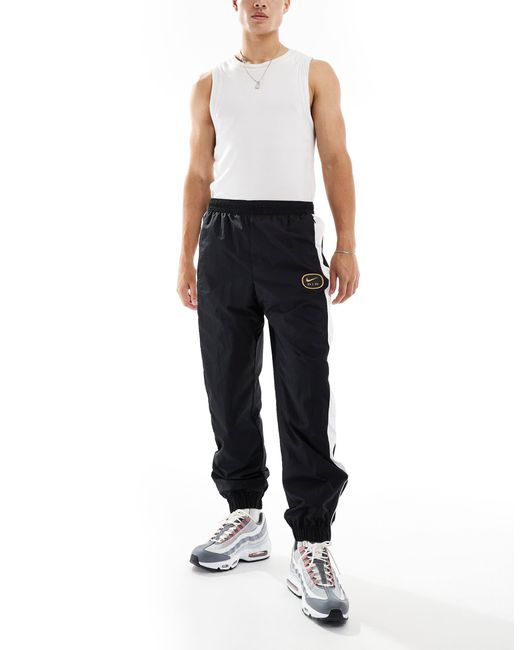 Nike Black Swoosh Air Woven joggers for men