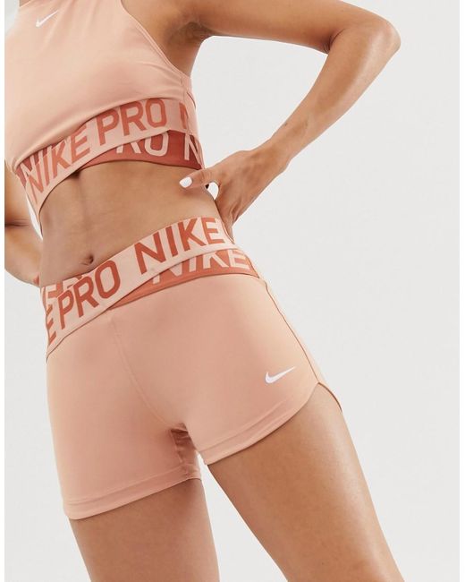 Pantalones cortos cruzados en dorado rosa Pro Training Nike de color Pink