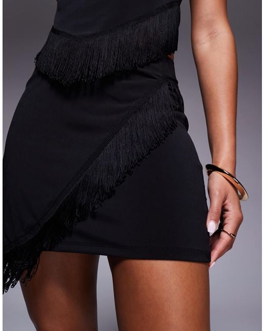 Mini-jupe portefeuille d'ensemble à franges ASOS en coloris Black