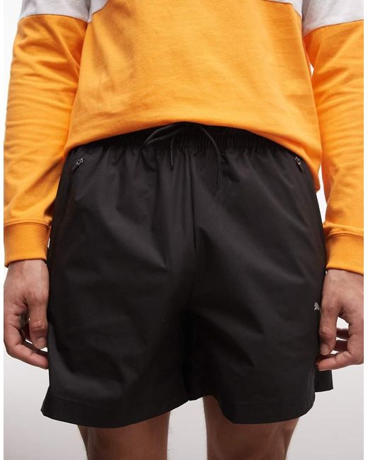 PUMA Orange Tech Relaxed 6" Shorts for men