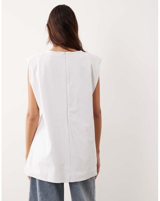 ARRANGE White Shoulder Pad Side Split Oversized Sleeveless Tee