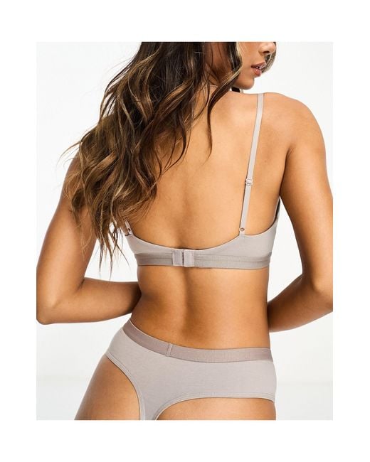 Calvin Klein Future Shift Unlined Bralette With Contrast Logo Waistband in  Gray