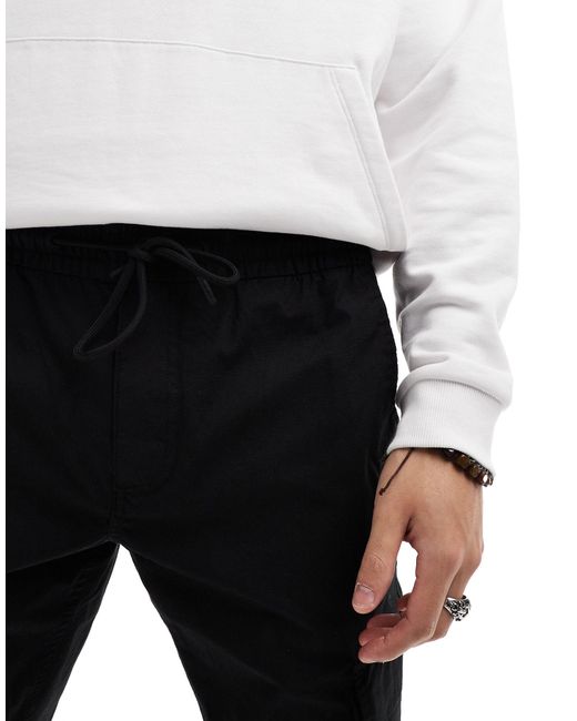 Calvin Klein White Skinny Cargo Trousers for men