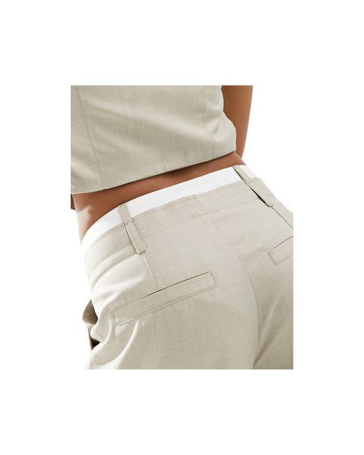 Pantaloni sartoriali a fondo ampio beige chiaro con vita stile boxer di Bershka in White