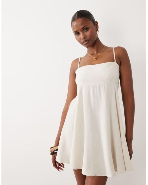 The Frolic White Exclusive Linen Look Square Neck Cinched Open Back Detail Floaty Mini Dress