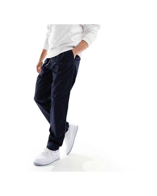 Pantalon chino fuselé - bleu foncé Tommy Hilfiger pour homme en coloris  Blanc | Lyst