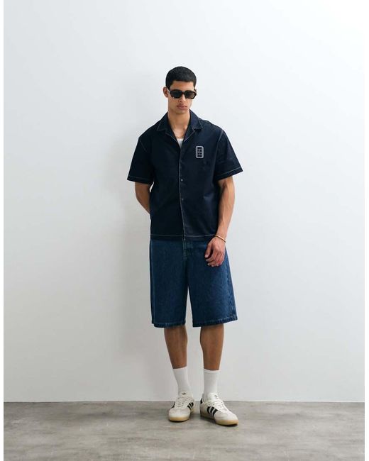 Lacoste Blue Short Sleeve Button Through Logo Polo Shirt for men
