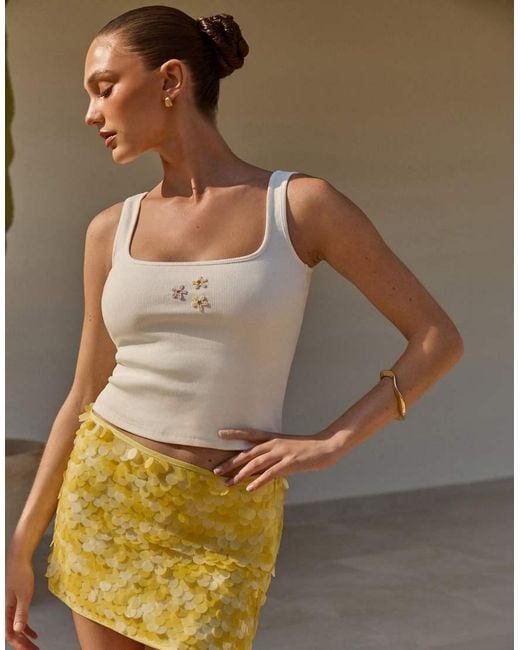 The Frolic White Exclusive Cotton Rich Bead Flower Front Tank Top