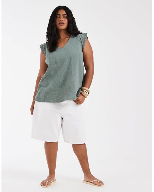 Top texturé à col v - clair ONLY en coloris Blue
