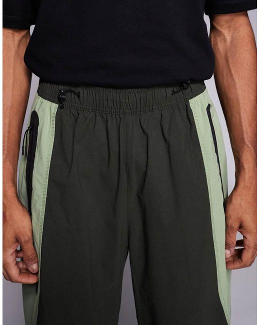 Nike Black Tech Dri-fit Woven Oversized joggers for men