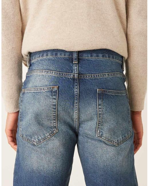 Vaqueros Azules De Pernera Ancha Acampanada Con Lavado Medio Tintado De ASOS de hombre de color Blue