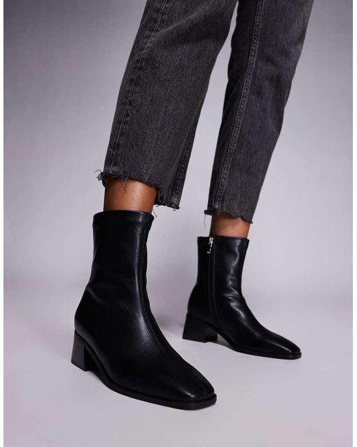 Botines Negro De Caña Alta Con Tacón Grueso Nimer De Simmi London SIMMI de color Black