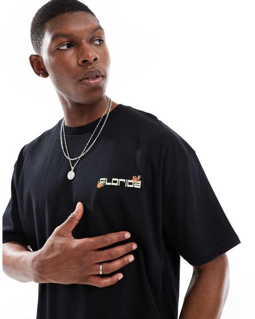 Camiseta Negra Extragrande Con Estampado Gráfico Veraniego De ASOS de hombre de color Black