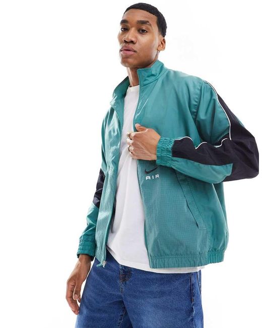 Nike Blue Swoosh Air Woven Tracktop for men