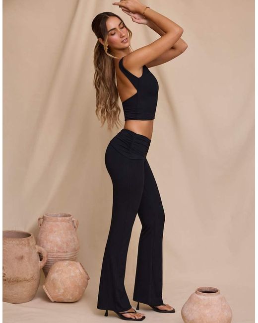 Oh Polly Natural Mid Waist Slinky Flare Trousers