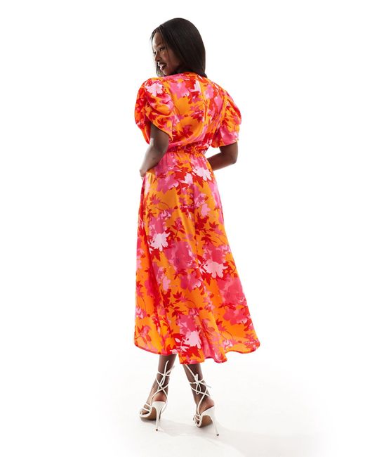 Robe mi-longue drapée satinée à manches bouffantes et imprimé floral - orange et rose AX Paris en coloris Red