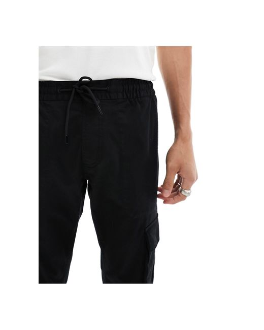Pantalones cargo negros Calvin Klein de hombre de color Black