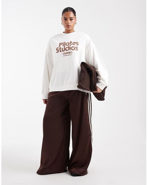 ASOS White Asos Design Curve Oversized Sweatshirt With Pilates Studio Graphic