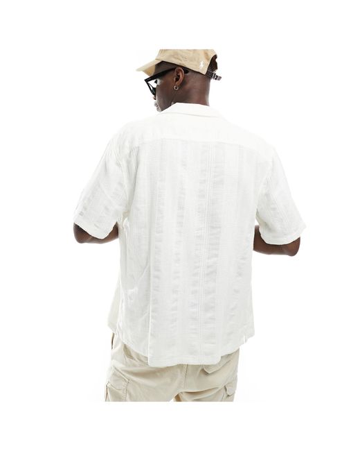 Chemise à manches courtes coupe décontractée en plumetis rayé Abercrombie & Fitch pour homme en coloris White